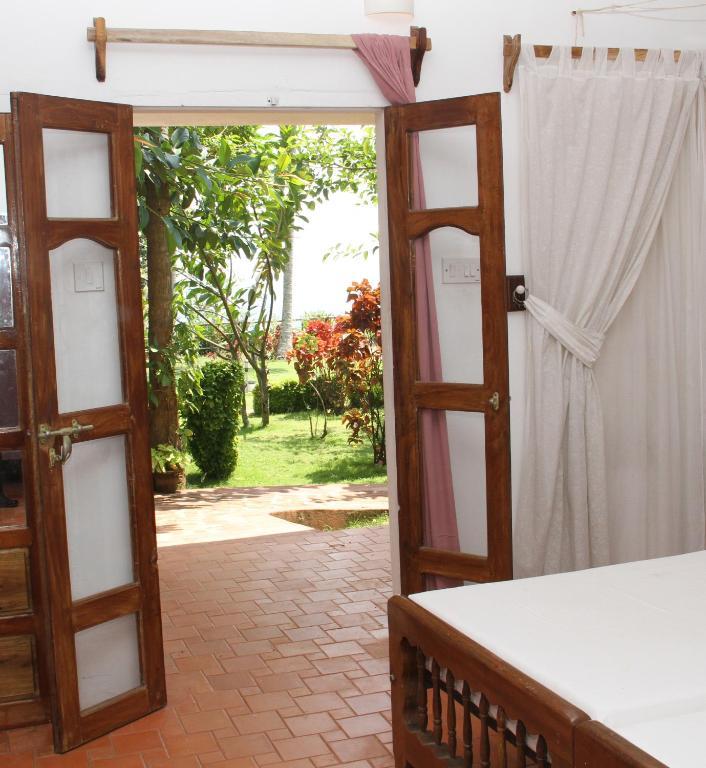 Hotel The Eco à Varkala Chambre photo